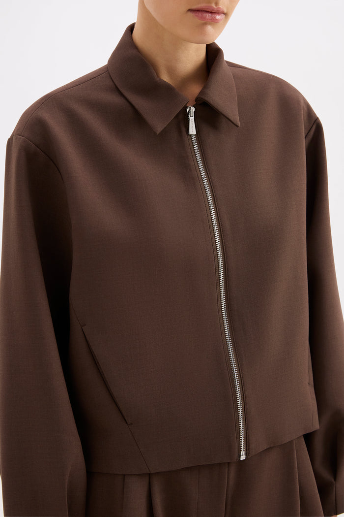 Brown jacket with a zipper on a white background