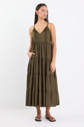Woman wearing an olive green tiered maxi dress with thin adjustable straps, a V-neckline, and relaxed fit.