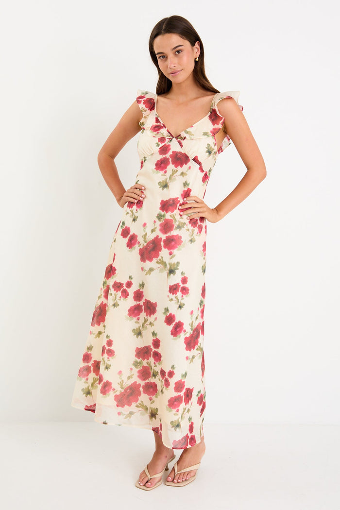 Woman wearing a floral white dress with frills
@col_pattern