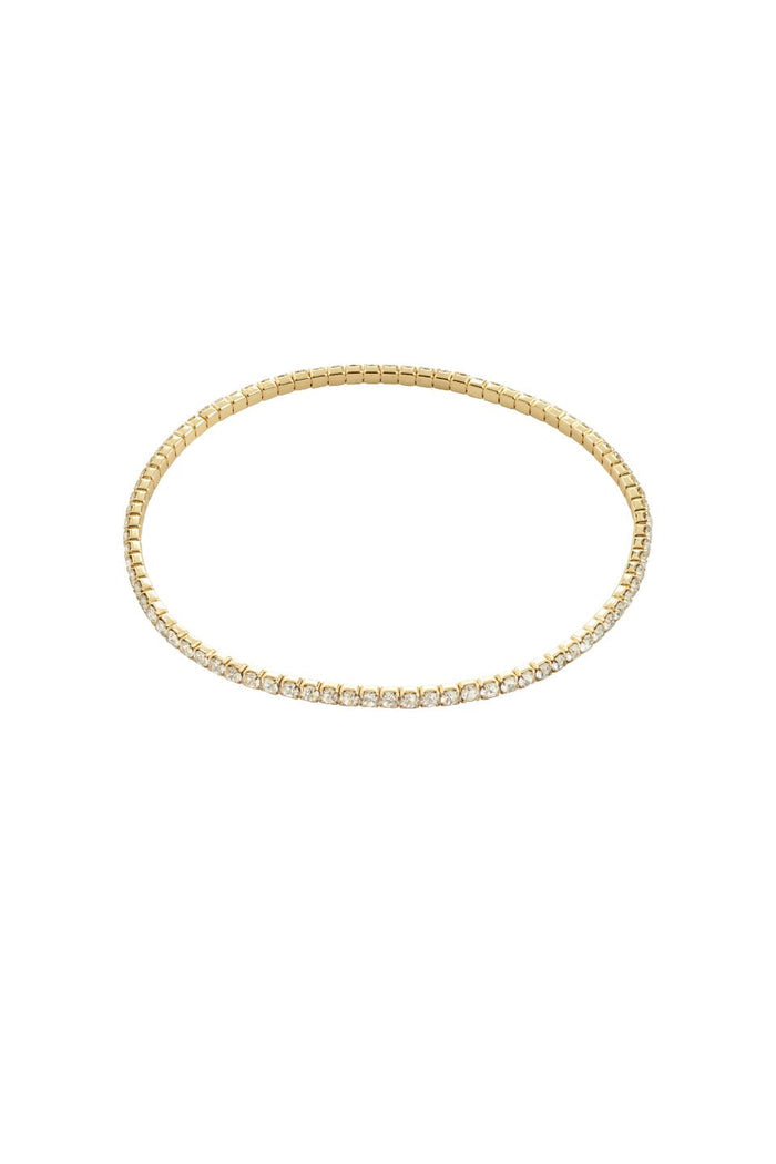 Gold bracelet on a white background