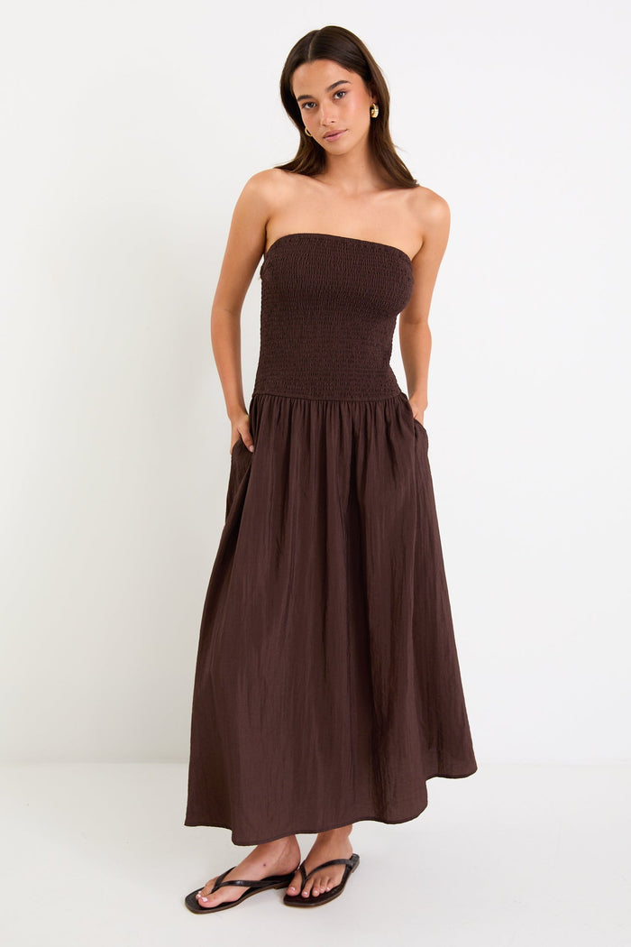 Woman wearing a brown dress