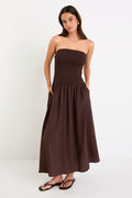 Woman wearing a brown dress