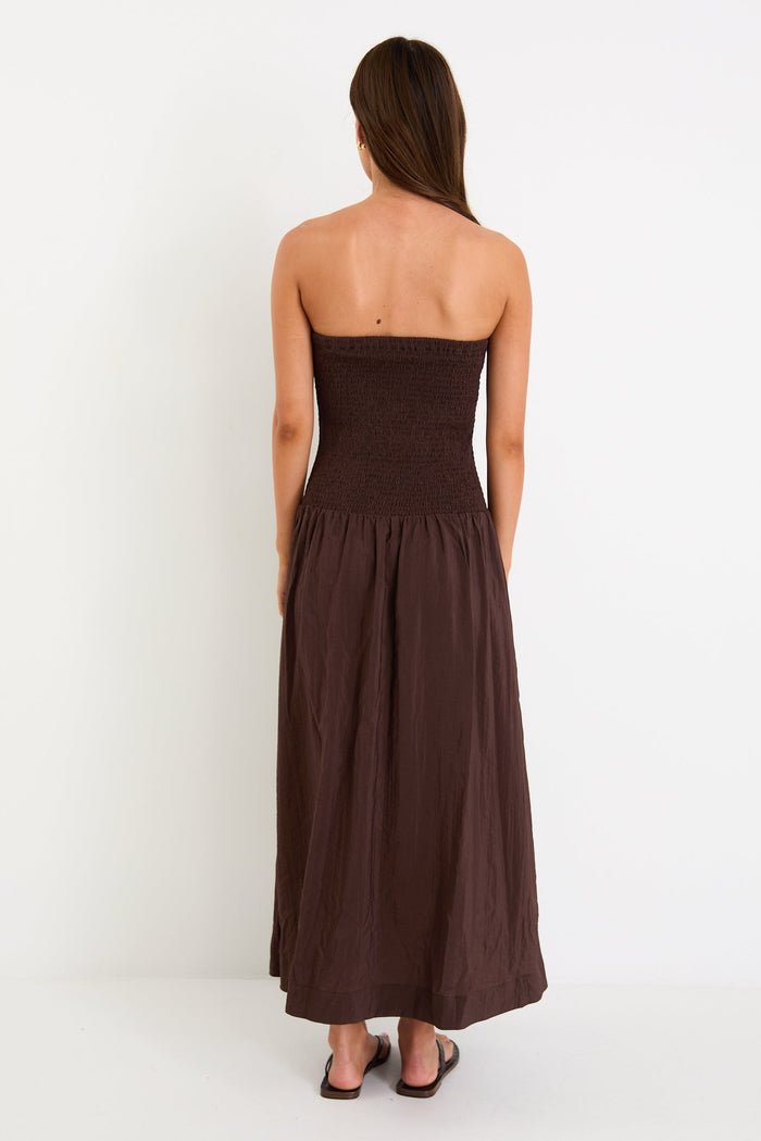 Woman wearing a brown dress