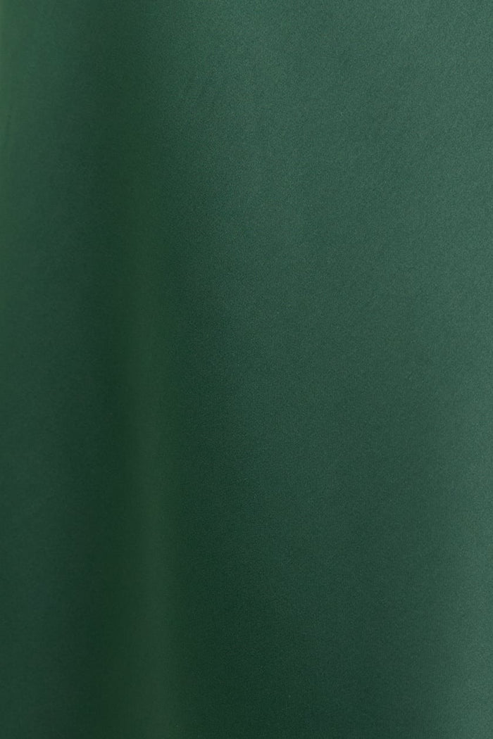 Close up of green dress fabric