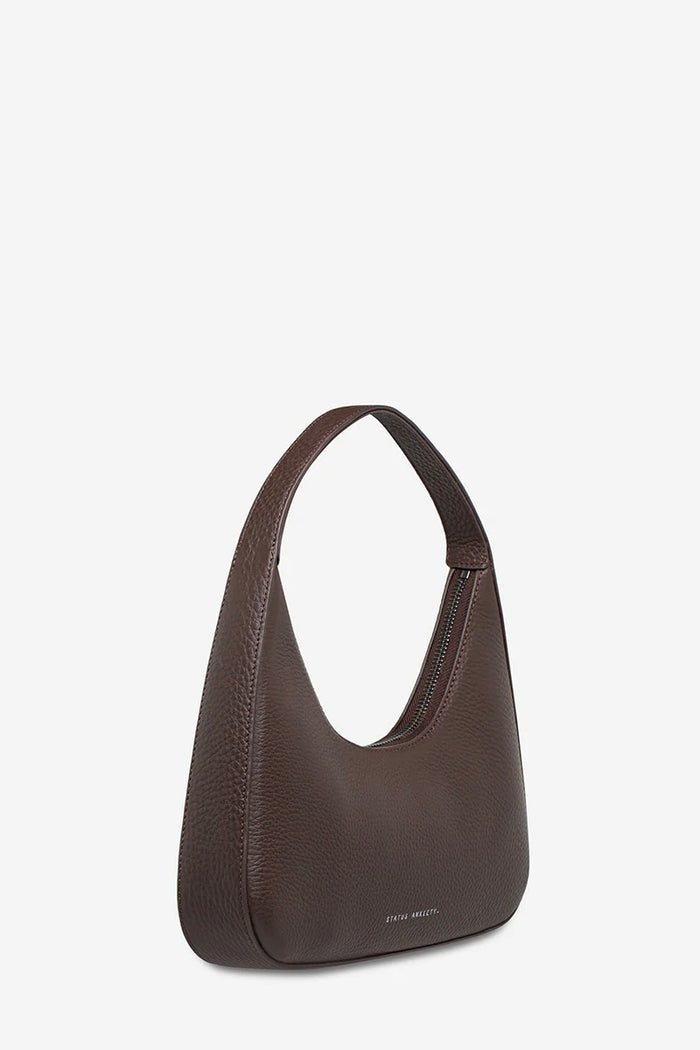 Brown shoulder bag by status anxiety