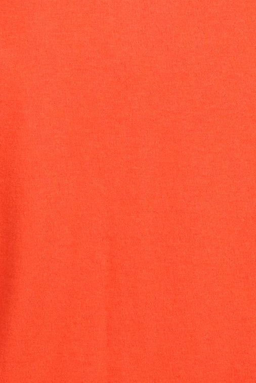 Close up of orange knit fabric