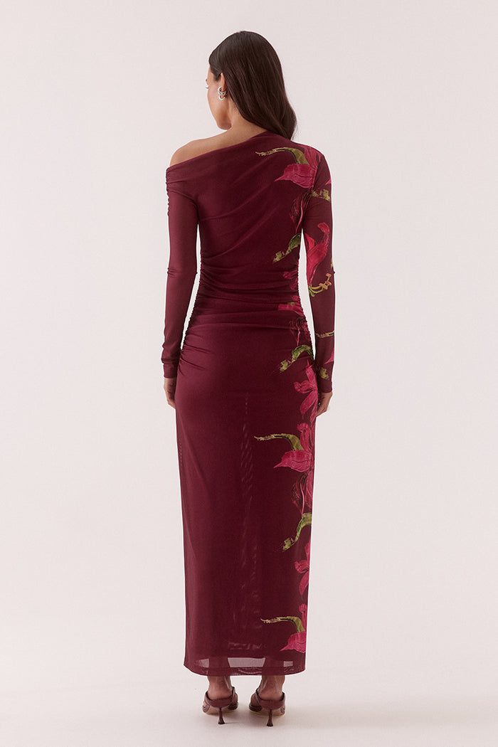 Burgundy evening gown with floral embroidery on a white background