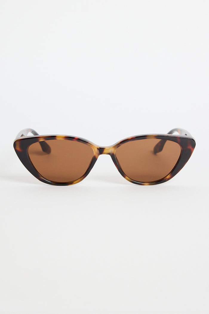 A pair of brown tortoiseshell cat-eye sunglasses with slim arms, photographed on a white background.