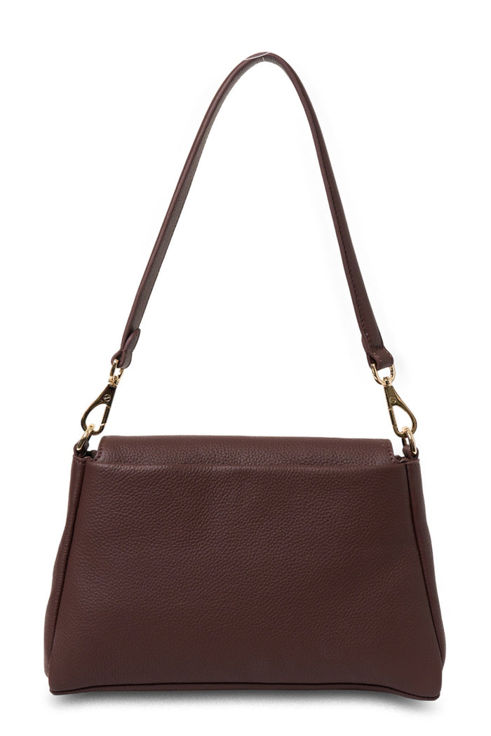 Brown leather handbag with a shoulder strap on a white background