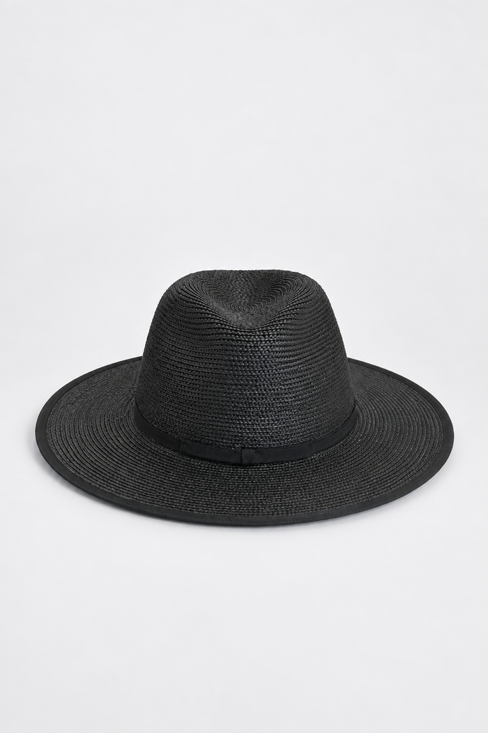 A black woven straw fedora hat with a matching black band, photographed from the front on a light gray background.