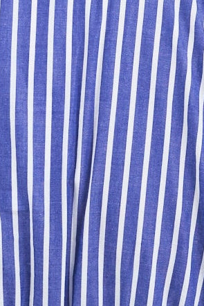 Close up of a blue and white striped fabric shirt.