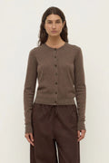 Woman wearing a brown wool cardigan