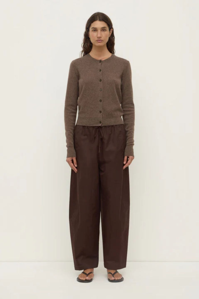 Woman wearing a brown wool cardigan