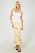 yellow floral maxi skirt with soft pink ditsy print, elasticated waistband, flowy silhouette
