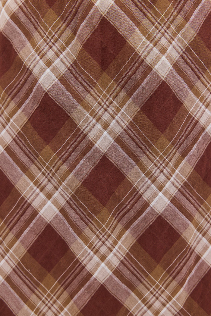 Plaid fabric pattern with brown and beige colors