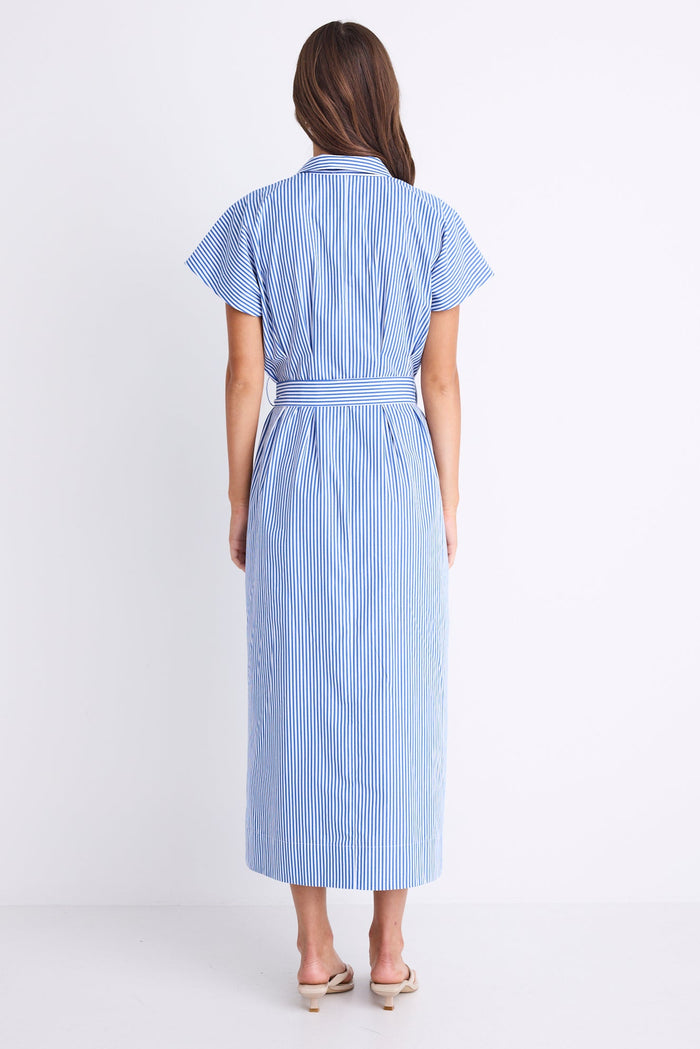 Woman wearing a bright blue striped midi shirt dress with short sleeves, button front, waist tie, and pleated skirt.
col_pattern