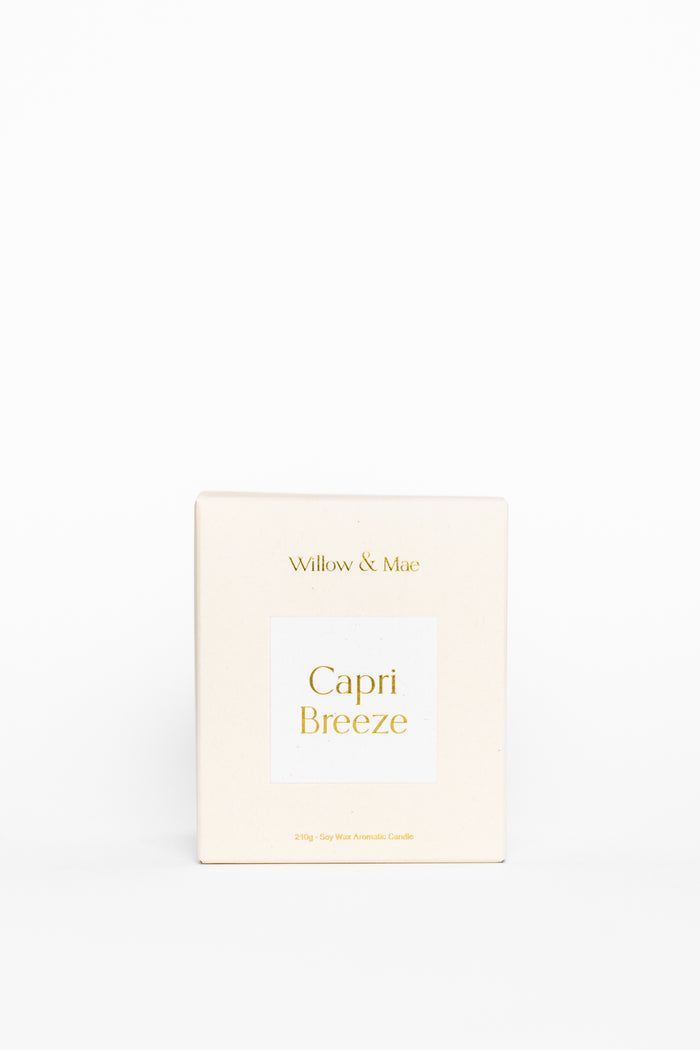Product packaging for 'Capri Breeze' by 'Willows & Mae' on a light beige background