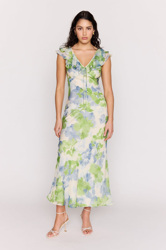 Woman wearing a floral dress on a white background