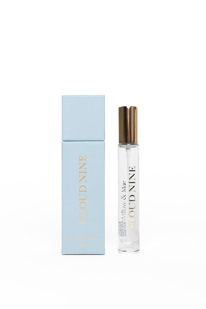 Perfume bottle and packaging with 'Nine' branding on a white background