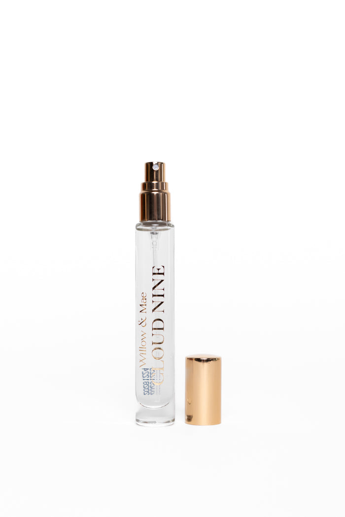 Perfume bottle labeled 'Oud Nine' on a white background