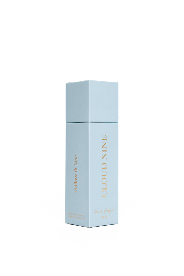 Light blue cylindrical product box with 'Cloud Nine' branding on a white background