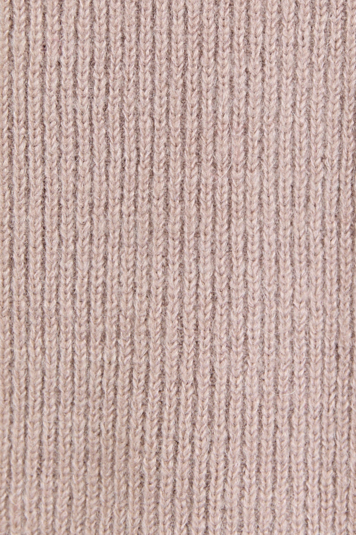 Close-up of a textured pink fabric surface
col_pattern