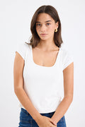 white rib fitted top with blue jeans