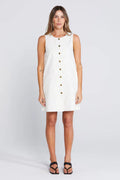 Woman wearing a light floral button down mini dress