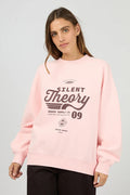 Person wearing a pink sweatshirt with 'Silent Theory' print on a gray background