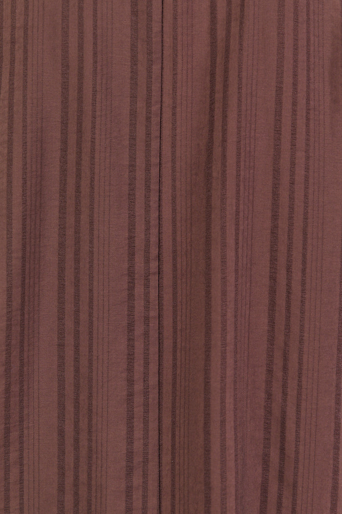 Brown fabric texture with vertical stripes