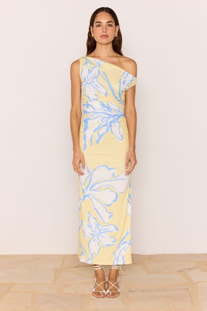 Model wears a yellow blue ruched dress