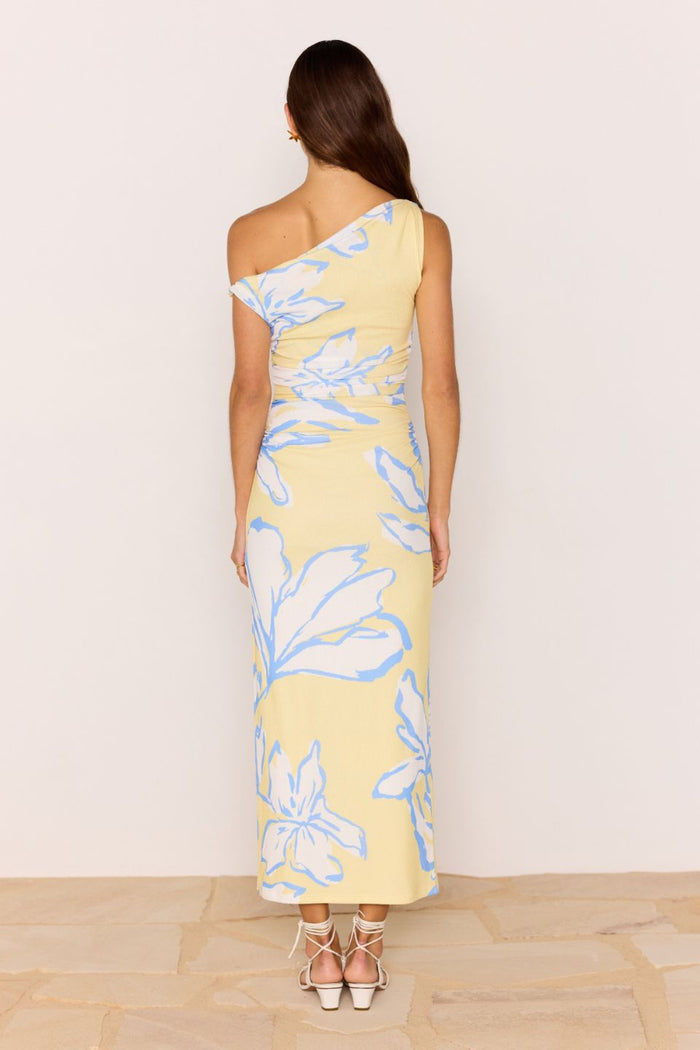 Model wears a yellow blue ruched dress