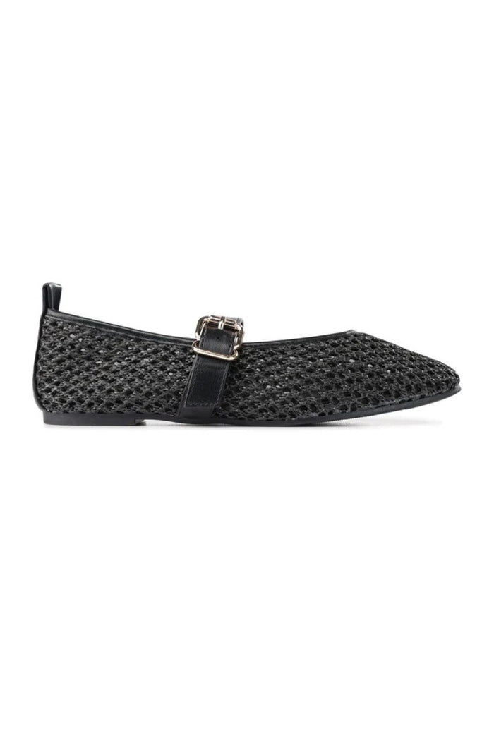 A pair of black pointed-toe flats with a textured, openwork mesh-like upper and a thin strap across the instep with a small gold-tone buckle, shown on a plain white background.