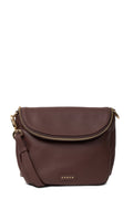 Brown leather handbag with gold zipper and strap on a white background