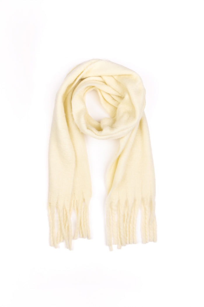Lemon yellow coloured scarf on a white background