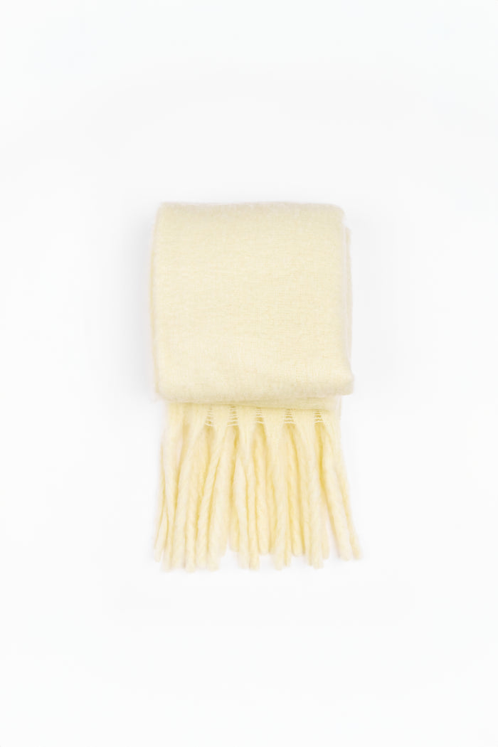 Lemon yellow coloured scarf on a white background