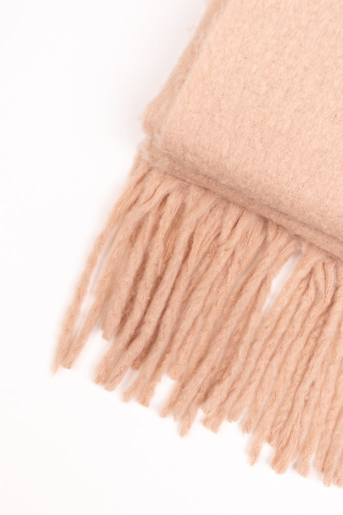 Tan scarf on a white background
