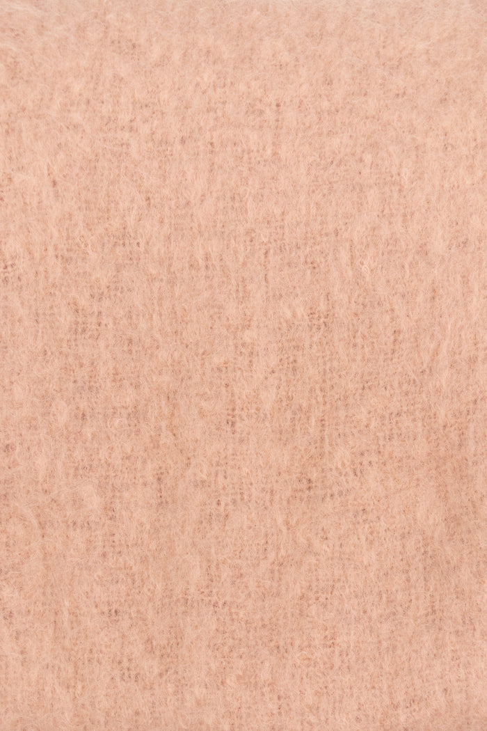 Tan colour swatch with a textured pattern