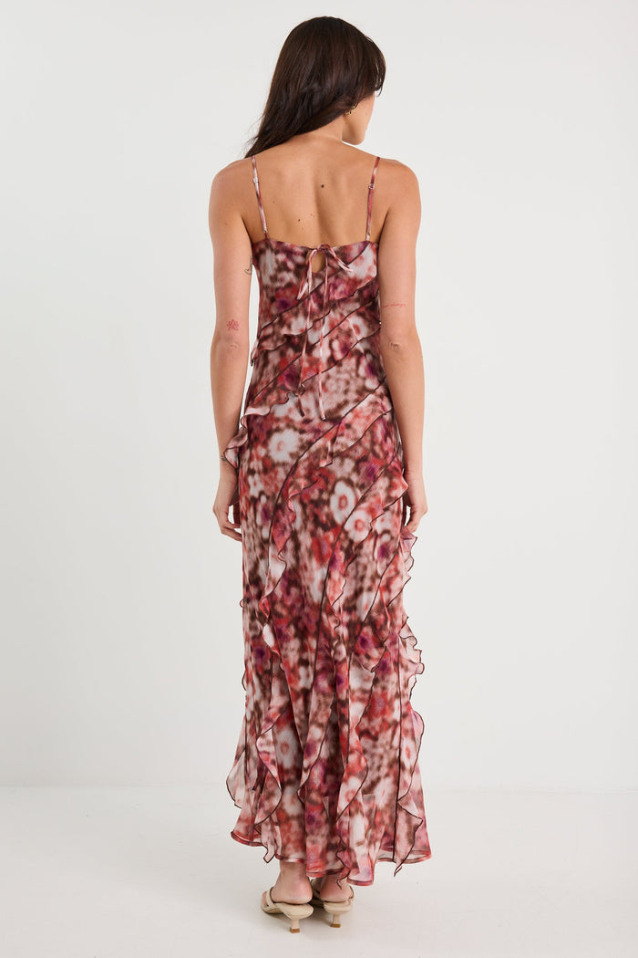 Woman wearing a floral dress on a white background