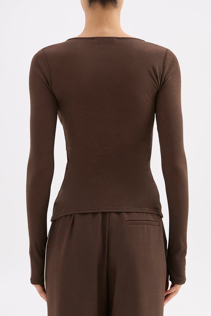 Brown long-sleeve top and pants on a plain background
