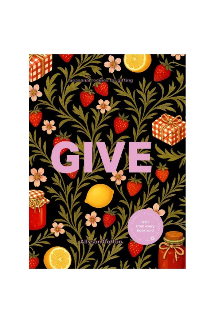 A square book cover or art print featuring the word “GIVE” in large pink letters over a black background filled with green leaves, strawberries, flowers, lemons, gift boxes, and red jars. The text “All-in-One Cookbook” appears near the bottom.