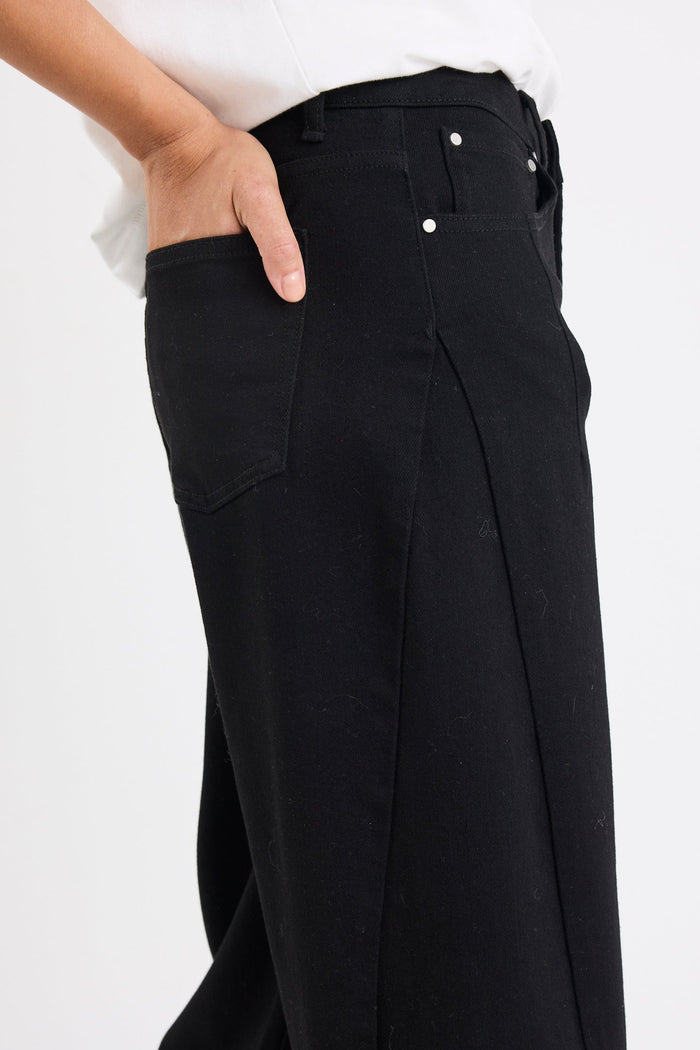 Black jeans with a white background