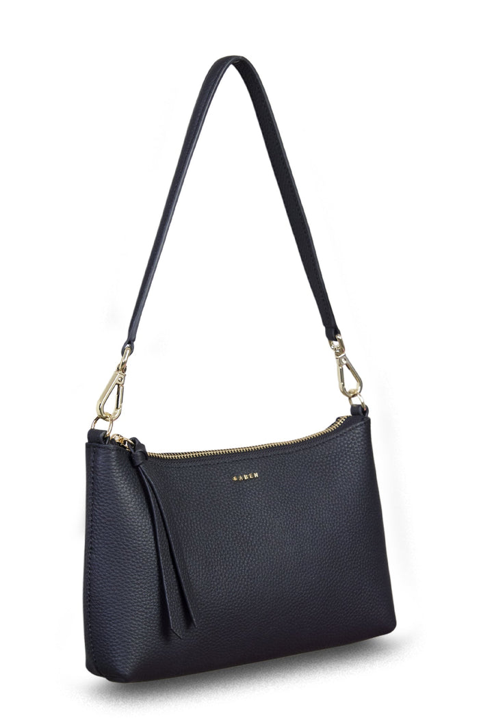 Black handbag with a strap on a white background