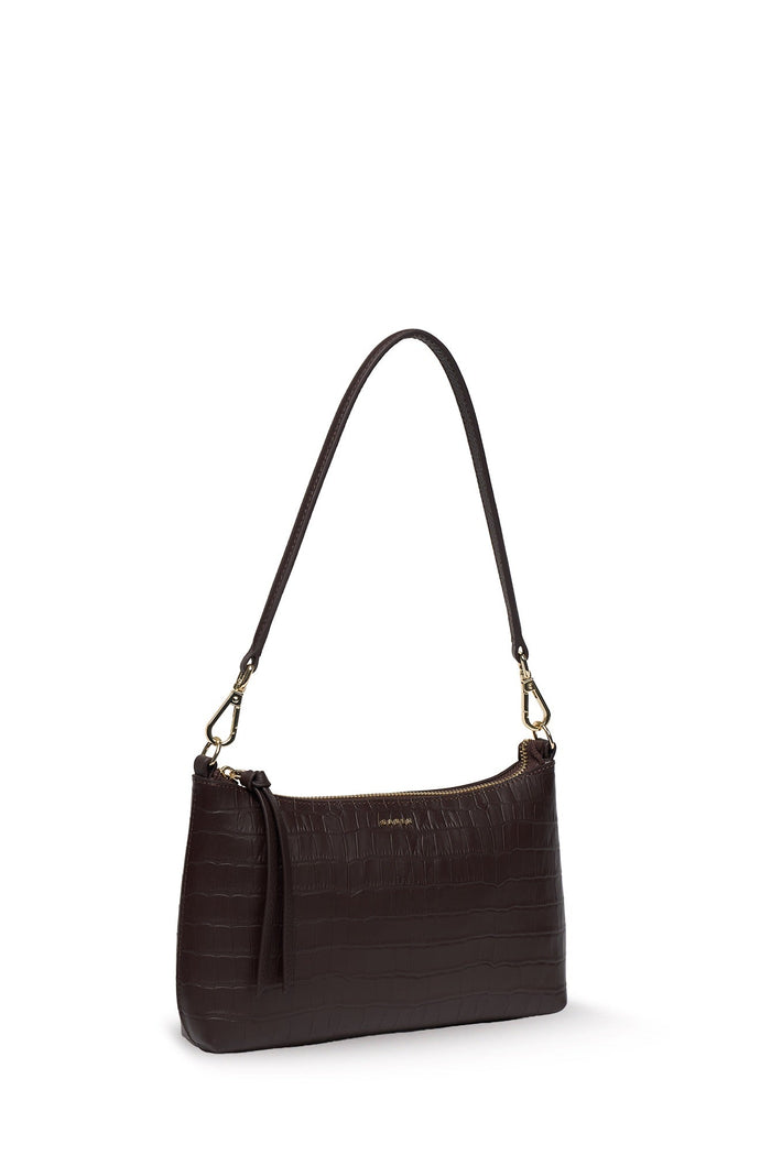 A dark brown crocodile-embossed leather shoulder bag with a matching tassel and gold-tone hardware, shown against a plain white background.