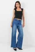 Women wearing wash blue jean and black tank