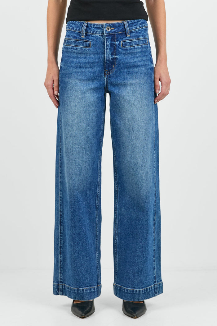 Women wearing wash blue jean and black tank