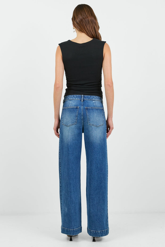 Women wearing wash blue jean and black tank