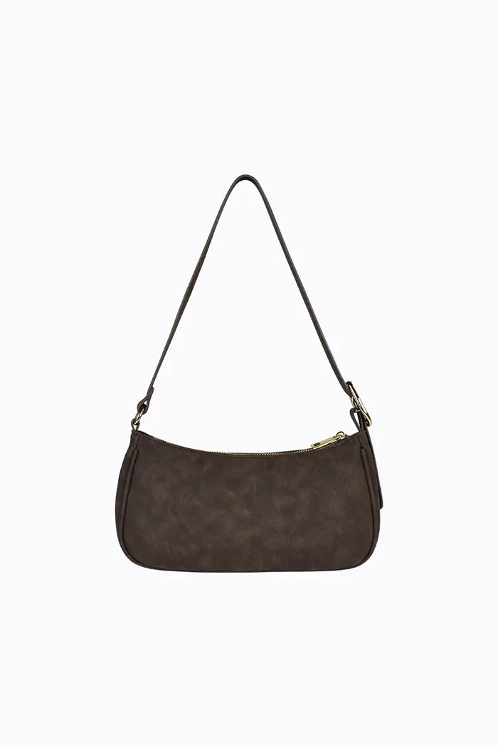 Brown handbag with a pattern on a white background
