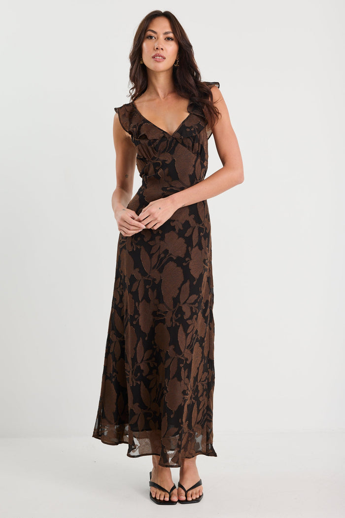 Woman wearing a black lace dress on a white background