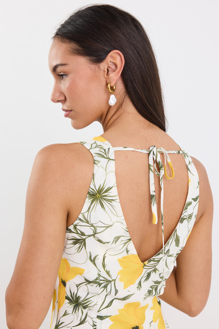 woman wearing buttercup floral dress